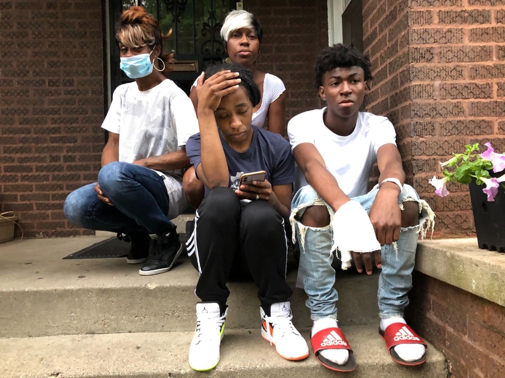 The family of 13-year-old Amarià Jones, who was killed by a stray bullet Saturday night at her Austin home. Patrick Smith / WBEZ