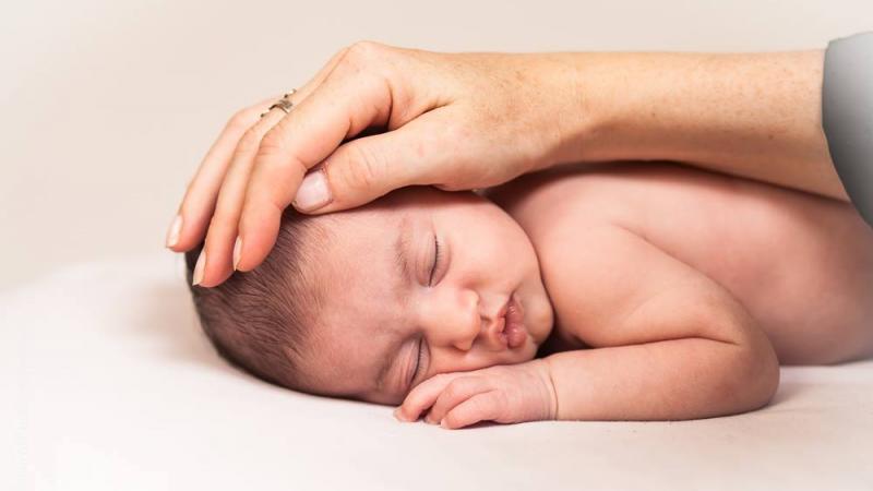 Lea-with-moms-hand.jpg Thumbnail