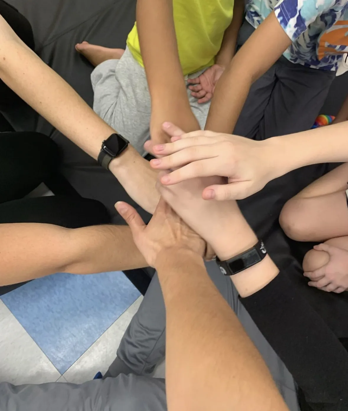 hands in the center all together