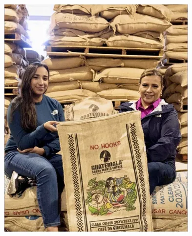 Coffee Farmers with their coffee